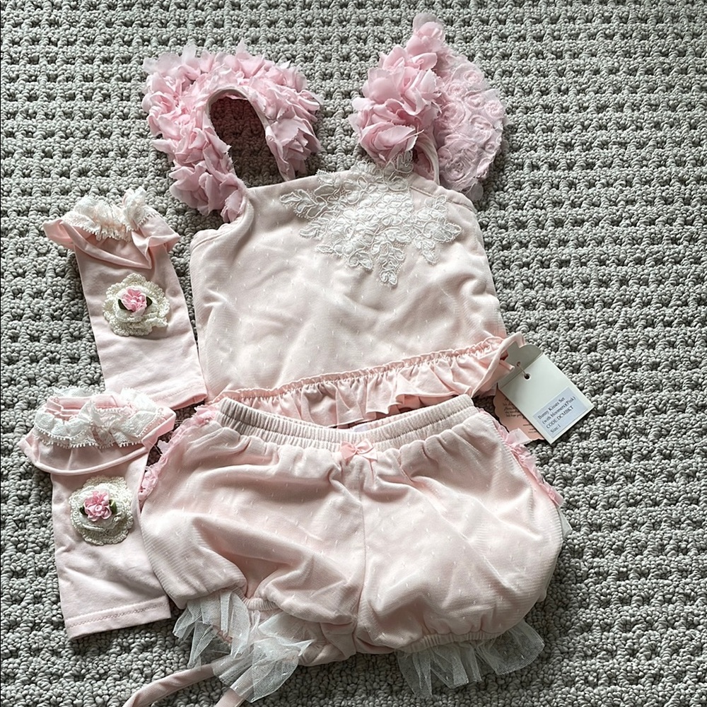 Adorable Pink Baby Outfit with Floral Details